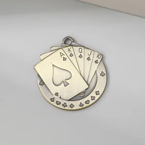 Close-up of vintage alloy poker card pendant featuring spade royal flush design