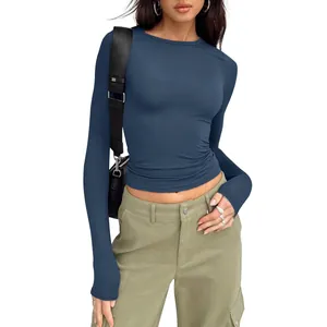 Professional detail view of a slim fit navy blue long sleeve crew neck T-shirt for women