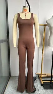 Detailed full view of a brown sleeveless yoga jumpsuit with flared legs on a mannequin