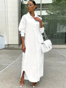 Full body view of a stylish plus size long sleeve white maxi shirt dress for women