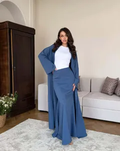 Fashionable blue two-piece skirt set with a long cardigan and a high-waisted skirt