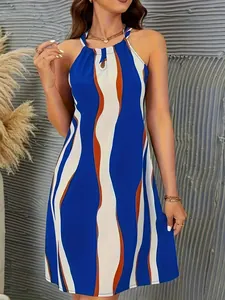Mouwloze midi-jurk in Boheemse stijl met een levendige blauwe en oranje golfprint