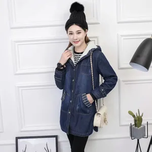 Detail shot of women's mid-length hooded denim jacket with warm white fleece lining