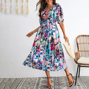 Floral print midi dress with V-neck and puff sleeves in a lifestyle setting