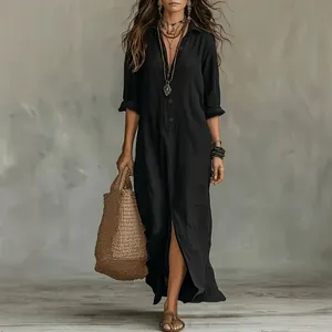 Schwarzes Bohemian Maxikleid mit Knöpfen, langen Ärmeln und eleganter Passform.