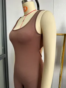 Close-up detail of a brown sleeveless hollow-out yoga bodysuit displayed on a mannequin