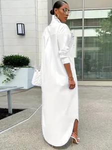 Back view of an elegant plus size white oversized long sleeve maxi shirt dress for women