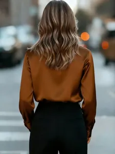 Back view of an elegant copper satin blouse for women featuring a smooth glossy finish
