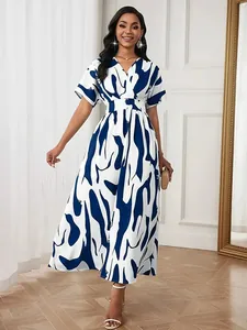 Elegant women's V-neck midi dress featuring a blue abstract print and a high waist
