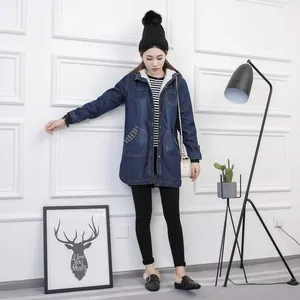 Full length view of a stylish winter fleece-lined denim coat with a hood on a model