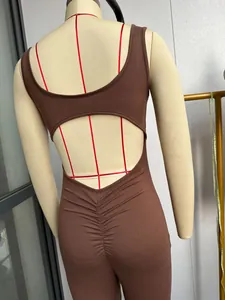 Detailed back view of a brown hollowed-out yoga jumpsuit shown on a mannequin.