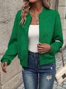 Stylish green zip-up bomber jacket with textured diamond pattern for women's autumn wear