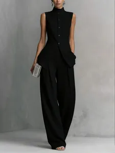 Elegantes schwarzes ärmelloses Weste- und Weithose-Set für einen anspruchsvollen Look.