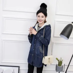 Women's warm hooded denim jacket featuring plush sherpa lining and striped pocket details