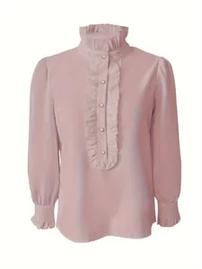 Detailed view of an elegant mauve blouse with high ruffled collar and pearl buttons
