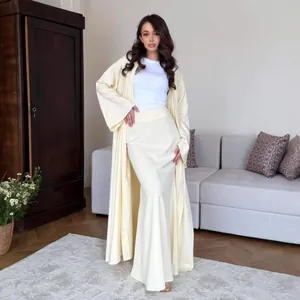 Elegant cream two-piece set featuring long abaya cardigan and maxi skirt for women fashion
