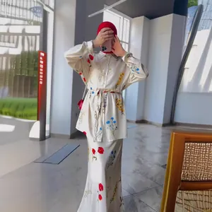 Elegant two-piece floral print satin shirt and matching long maxi skirt set for women