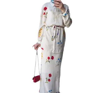 Elegant floral print long sleeve shirt and matching long skirt set for women in creamy white
