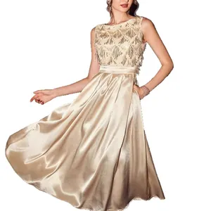Elegant champagne satin evening gown with sequin bodice for formal galas and parties