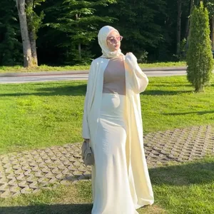 Elegant two-piece modest fashion set with long cardigan and skirt in cream cotton linen
