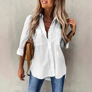 Modieuze witte losse blouse met lange mouwen, zakken en een klassieke kraag voor dames