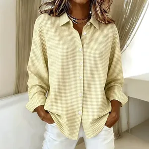 Elegant women's light yellow gingham long sleeve button-down shirt featuring a lapel collar