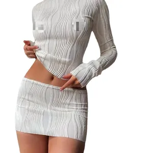 Elegant white wavy textured long sleeve crop top and mini skirt two-piece set for women