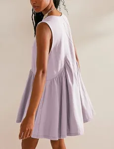 Detail of sleeveless lavender dress showing back pleats and loose babydoll silhouette.