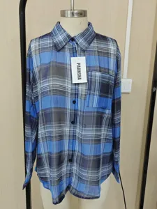 Detailed view of a stylish blue and black plaid chiffon sun protection shirt for women