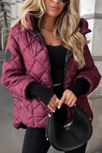 Detail view of a stylish burgundy diamond quilted hooded winter jacket for women