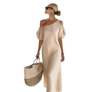 Elegant striped off-the-shoulder maxi dress with puff sleeves for summer beach vacation