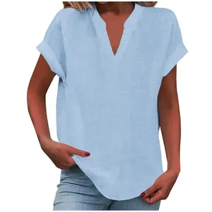 Detailed view of a light blue V-neck short sleeve women's linen-textured shirt