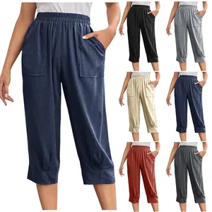 Detail view of loose-fit cotton linen casual pants with elastic waist and large pockets.