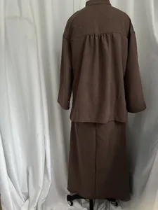 Back view of a brown imitation linen two-piece set featuring long shirt and skirt.