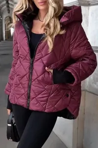 Detailed macro view showing the texture of a maroon diamond quilted hooded puffer jacket.