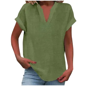 Detailed view of women's olive green V-neck blouse with textured fabric and rolled sleeves