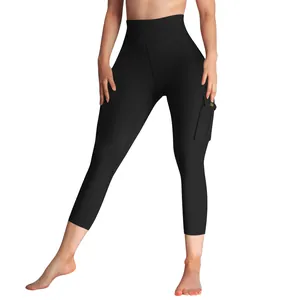 Detailed view of women's black high waist yoga leggings with a side cargo pocket.