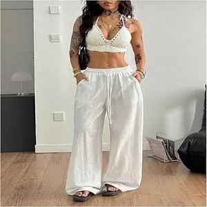 Loose white cotton-linen wide-leg casual pants featuring an elastic drawstring waist for summer