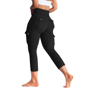 Detail of black cargo yoga leggings showing peach lift effect and side pockets.