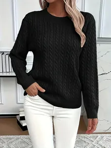 Detailed view of a classic black cable knit sweater with a stylish round neck design