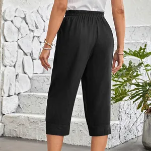 Detailed back view of women's black cotton linen wide leg cropped pants with elastic waist