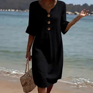 Elegant black cotton linen V-neck dress with buttons and ruffle sleeves for summer beach
