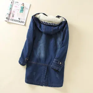 Back view detail of a blue hooded denim jacket featuring warm white fleece lining