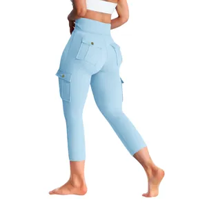 Back view of high-waist light blue cargo style yoga pants with functional pockets