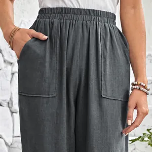 Close-up of charcoal cotton linen casual pants with elastic waist and large pockets