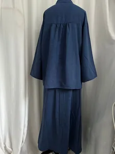 Detailed back view of dark blue linen-look asymmetric long shirt and skirt two-piece set