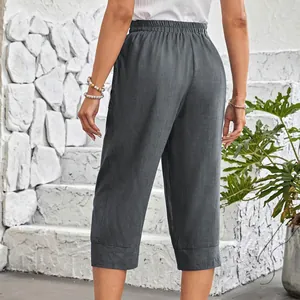 Rear view of grey cotton linen capri pants with elastic waist for women