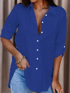 Royal blue mid-length button-down shirt for women with roll-up sleeves and slits