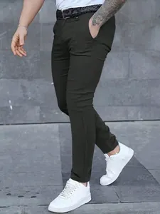 Detailed shot of dark charcoal slim-fit casual trousers for men in a business style