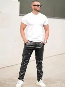 Full shot of men's slim-fit black PU leather pants in a casual street style look